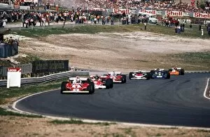 James Hunt 1976 Collection: Formula One World Championship: Belated race winner Niki Lauda Ferrari 312T2 leads on the opening