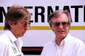 F1 Collection: Formula One World Championship: Bernie Ecclestone, FOM President, right, with Herbie Blash
