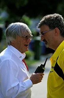 Images Dated 24th March 2003: Formula One World Championship: Bernie Ecclestone, left, chats to Jordan team owner Eddie Jordan
