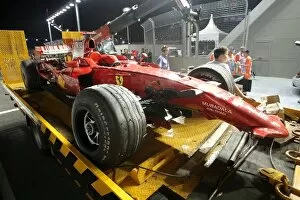 2008 Collection: Formula One World Championship: The car of Kimi Raikkonen Ferrari F2008 is recovered after he