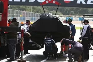 Formula One World Championship: The car of Rubens Barrichello Williams FW32 is bought back to the pits on a truck