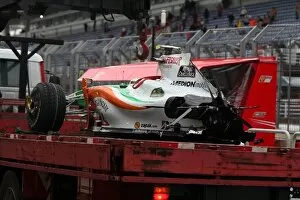 Images Dated 17th October 2009: Formula One World Championship: Car of Vitantonio Liuzzi Force India F1 VJM02 is brought back to