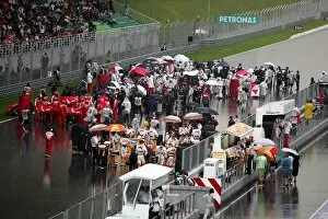 Images Dated 5th April 2009: Formula One World Championship: The cars line up on the grid after the race was suspended due to