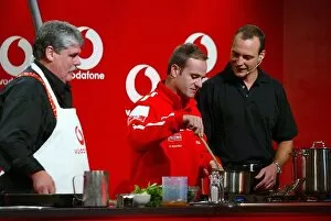 Images Dated 6th March 2003: Formula One World Championship: Chef Aristos Papandroulakis guides Rubens Barrichello Ferrari