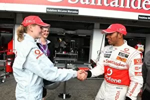 Images Dated 24th July 2010: Formula One World Championship: Competition winner with Lewis Hamilton McLaren