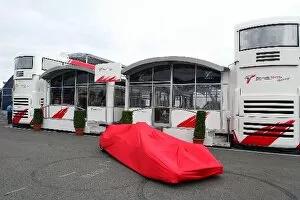 Images Dated 1st July 2005: Formula One World Championship: A covered Toyota TF105 outside the Toyota motorhome