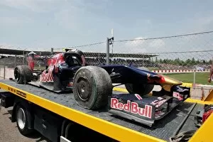 Formula One World Championship: The damaged Scuderia Toro Rosso STR4 of Sebastien Buemi Scuderia Toro Rosso STR4
