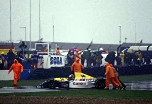 Great Britain Collection: Formula One World Championship: Damon Hill, Williams FW15C, is pushed off the track by marshals