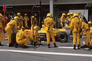Formula One World Championship: Damon Hill Jordan Mugen Honda 199 makes a pit stop