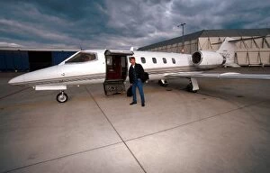 Images Dated 9th October 2001: Formula One World Championship: Damon Hill with the Lear Jet that he uses to fly to the races