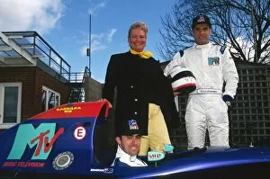 Formula One World Championship: David Brabham with team mate Roland Ratzenberger stand with Barbara Behlau