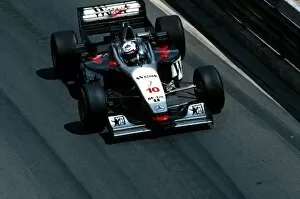 Monaco Collection: Formula One World Championship: David Coulthard, McLaren MP4-12 DNF slides the car in practice