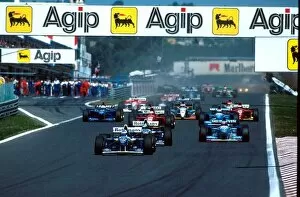 Images Dated 6th October 2004: Formula One World Championship: David Coulthard leads at the start of the race whilst Katayama