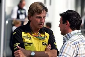 Images Dated 23rd July 2004: Formula One World Championship: David Sears Super Nova team owner talks with Mark Blundell