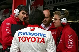 Images Dated 27th August 2004: Formula One World Championship: Dieter Gass Toyota Race Engineer talks with Ricardo Zonta Toyota