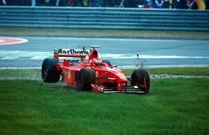Spa-francorchamps Collection: Formula One World Championship: Eddie Irvine Ferrari F300 goes off