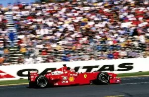 First Win Gallery: Formula One World Championship: Eddie Irvine Ferrari F199 wins his first Grand Prix