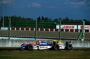 Japan Gallery: Formula One World Championship: Eddie Irvine Jordan 193 blocks Damon Hill