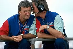 Formula One World Championship: Eddie Jordan Jordan Team Principal talks with John Walton Jordan Team Manager