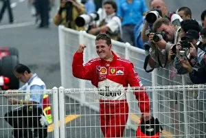 Team Mates Gallery: Formula One World Championship: Eighth placed Michael Schumacher Ferrari celebrates his sixth