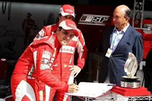 Formula One World Championship: Emilio Botin President Santander with Felipe Massa Ferrari