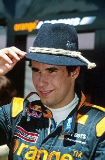 Images Dated 14th May 2002: Formula One World Championship: Enrique Bernoldi Arrows tries out the local fashions