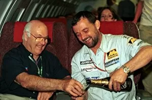 Images Dated 28th September 2001: Formula One World Championship: European Aviation and Minardi team manager Paul Stoddart pours