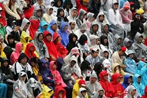 Images Dated 8th October 2005: Formula One World Championship: Fans brave the rain to watch qualifying