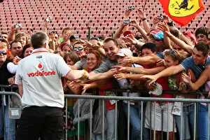 Images Dated 29th July 2010: Formula One World Championship: Fans clamour for Steve Cooper McLaren Press Office