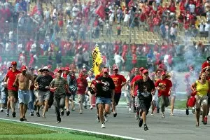 2004 Collection: Formula One World Championship: Fans invade the track at the end of the race