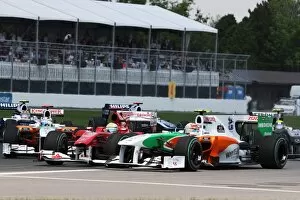 Formula One World Championship: Felipe Massa Ferrari F10 and Vitantonio Liuzzi Force India F1 VJM03 make contact at