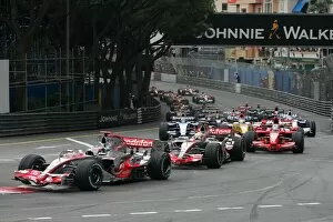 Monte Carlo Gallery: Formula One World Championship: Fernando Alonso McLaren Mercedes MP4-22 leads the field at the start