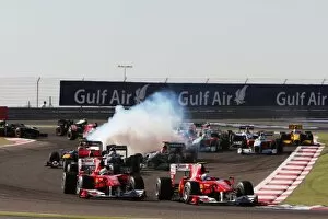 Bahrain Gallery: Formula One World Championship: Fernando Alonso Ferrari F10 passes team mate Felipe Massa Ferrari
