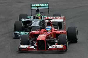 Sao Paulo Gallery: Formula One World Championship: Fernando Alonso Ferrari F138 leads Lewis Hamilton Mercedes AMG F1 W04