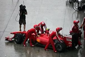 Images Dated 5th April 2009: Formula One World Championship: Ferrari retiren the car of Kimi Raikkonen Ferrari F2009