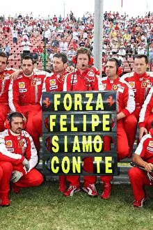 Images Dated 26th July 2009: Formula One World Championship: Ferrari and Rob Smedley Ferrari Race Engineer pay their best