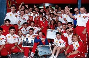 Formula One World Championship: The Ferrari team celebrate