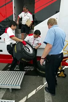 Images Dated 12th September 2003: Formula One World Championship: FIA personnel in the Bridgestone compound