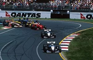 Australia Collection: Formula One World Championship: First corner the Mclarens of Hakkinen and Coulthard lead
