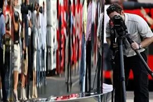 Formula One World Championship: FOM Cameraman with a Canon Stills camera