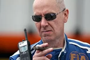 Images Dated 19th July 2008: Formula One World Championship: Gary Harstein FIA Doctor smokes a cigar