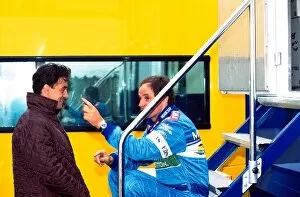 Formula One World Championship: Gerhard Berger, Benetton B197 9th place chats with team mate Jean Alesi