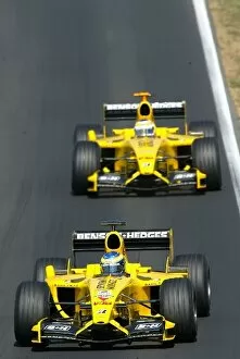 Images Dated 24th August 2003: Formula One World Championship: GP debutante Zsolt Baumgartner Jordan Ford EJ13 leads Giancarlo
