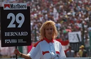 Images Dated 26th February 2001: Formula One World Championship: A grid girl holds the board for Eric Bernards Lola