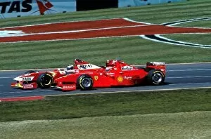 Formula One World Championship: Heinz-Harald Frentzen Williams Mecachrome FW20 overtakes Eddie Irvine Ferrari F300