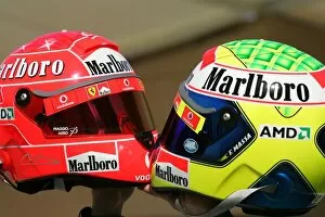 Bahrain Gallery: Formula One World Championship: The helmets of Michael Schumacher Ferrari and Felipe Massa Ferrari