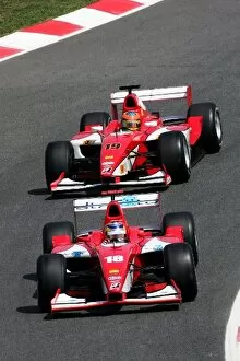 Images Dated 12th May 2006: Formula One World Championship: Hiroki Yoshimoto BCN Competicion leads team mate Timo Glock BCN