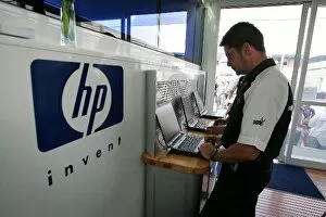 Images Dated 25th July 2004: Formula One World Championship: HP Techicians at work in the Williams Motorhome
