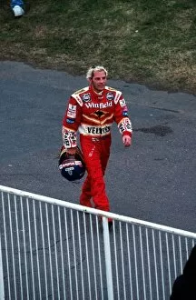 Formula One World Championship: Jacques Villeneuve Williams walks back to the pits