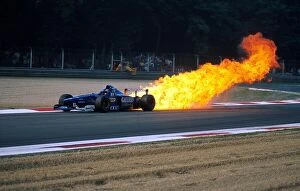 Fire Gallery: Formula One World Championship: Jarno Trulli Prost AP01 has a huge oil fire during practice